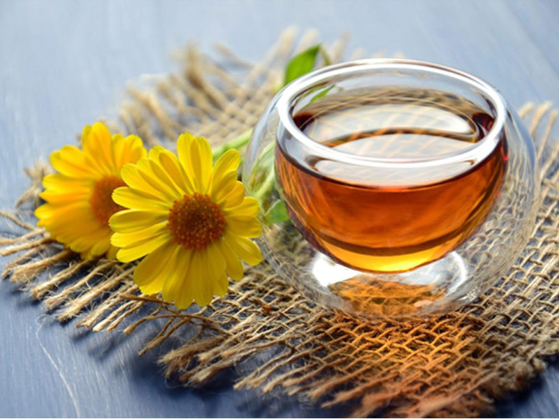trà hoa cúc giảm đau dạ dày
